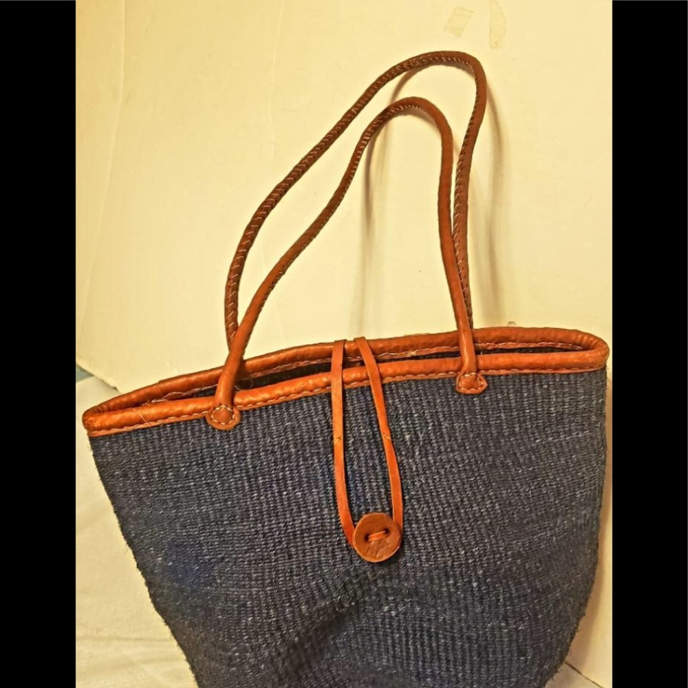 Blue sisal fiber tote with brown leather trim